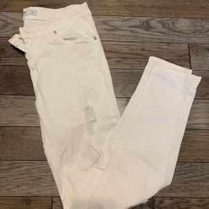 Distressed white jeans